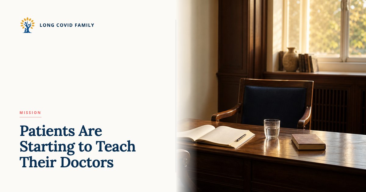 Long COVID patient-clinician partnership — editorial photo of a consulting room with two empty navy chairs facing each other across a wooden desk, open notebook between them, late golden-afternoon light.